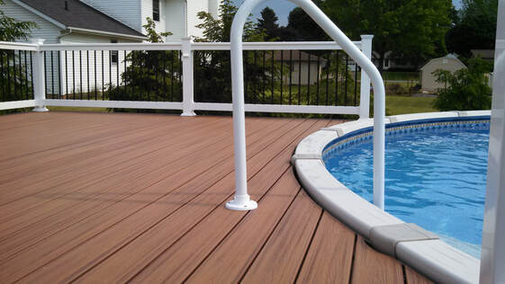 Buckstone Northeast Ohio Deck Builders : Low-mainenance Trex Pool Deck with vinyl railing and aluminum balusters built in Jackson Township, Stark County, Northeast Ohio